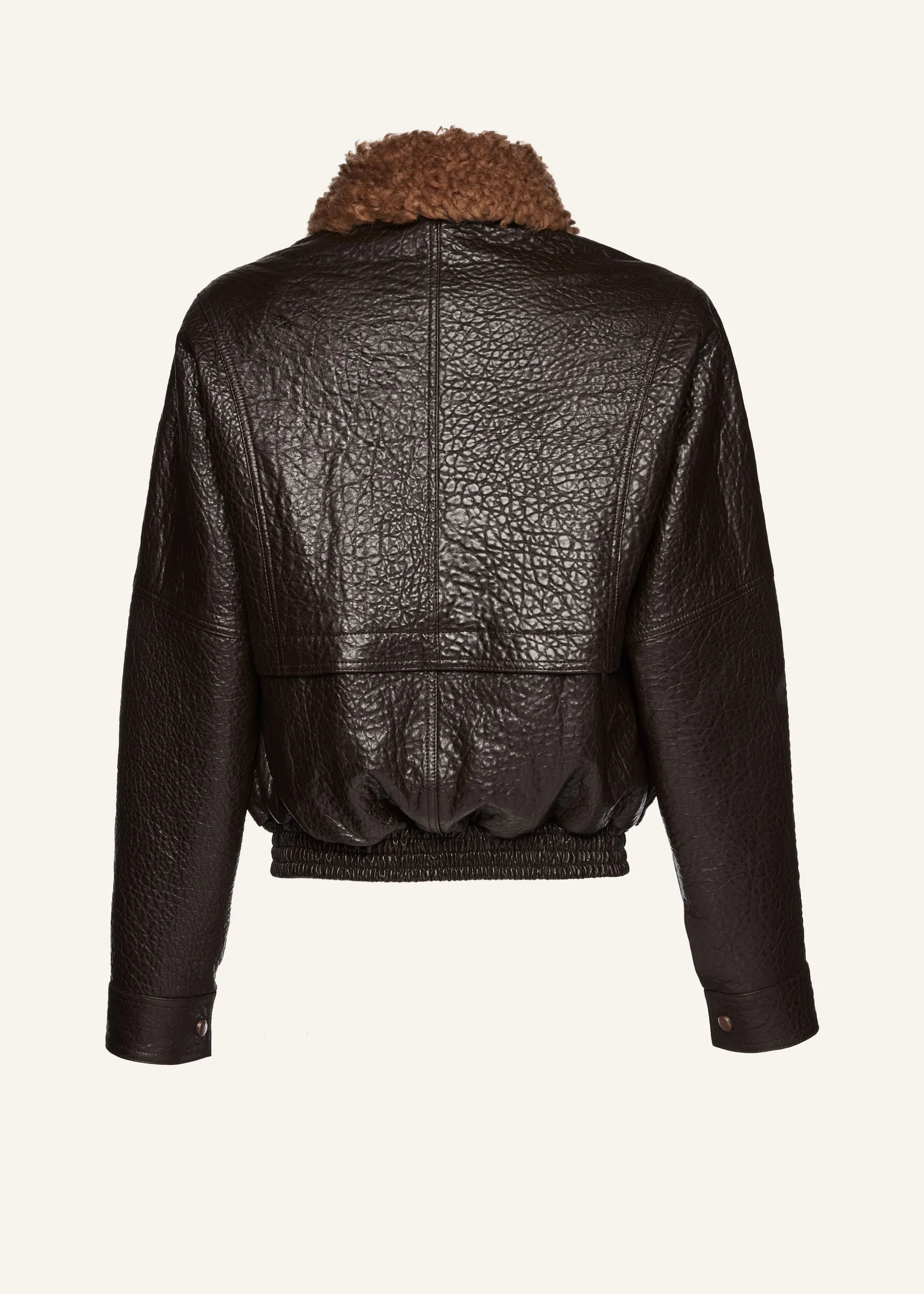 Vintage embossed leather bomber jacket in brown